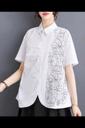 W51123 LINE WORK FLOWER TOP (BLUE, WHT, BLK)